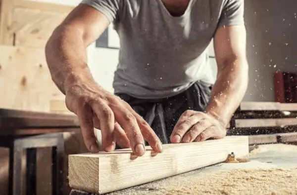 custom wooden door manufacturing worker